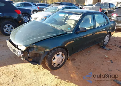 2000 Toyota Corolla Ve из США, поврежденный, VIN 2T1BR12E7YC361109